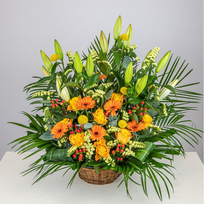 Composition florale deuil colorée du fleuriste Cannelle Orange